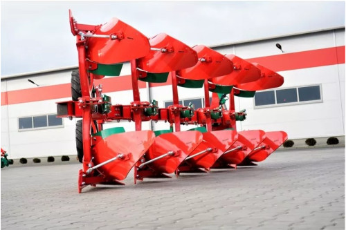 Pług obracalny z zabezpieczeniem resorowym